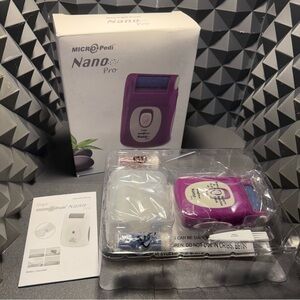 New in Box Emjoi Micropedi Nano Pro Electric Foot File - Purple